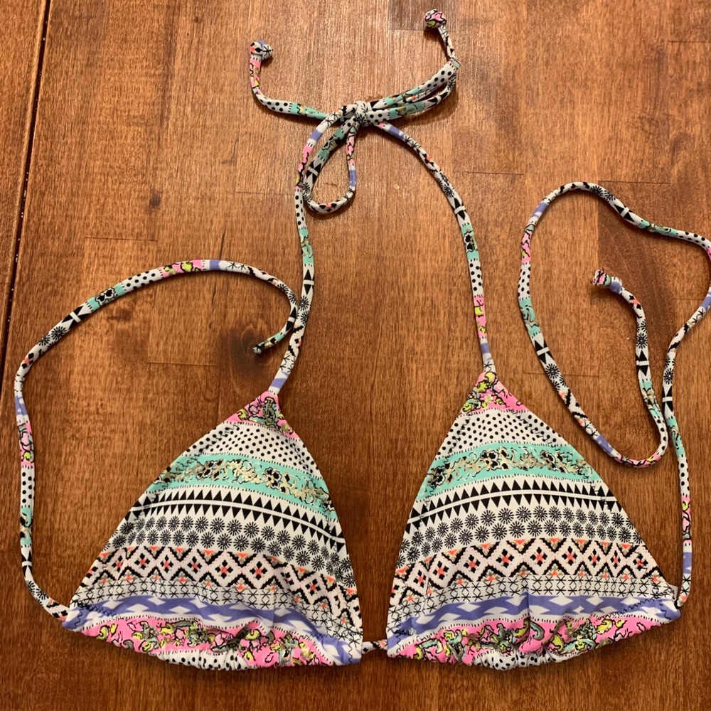 Victoria’s Secret Medium multi-colored bikini top.